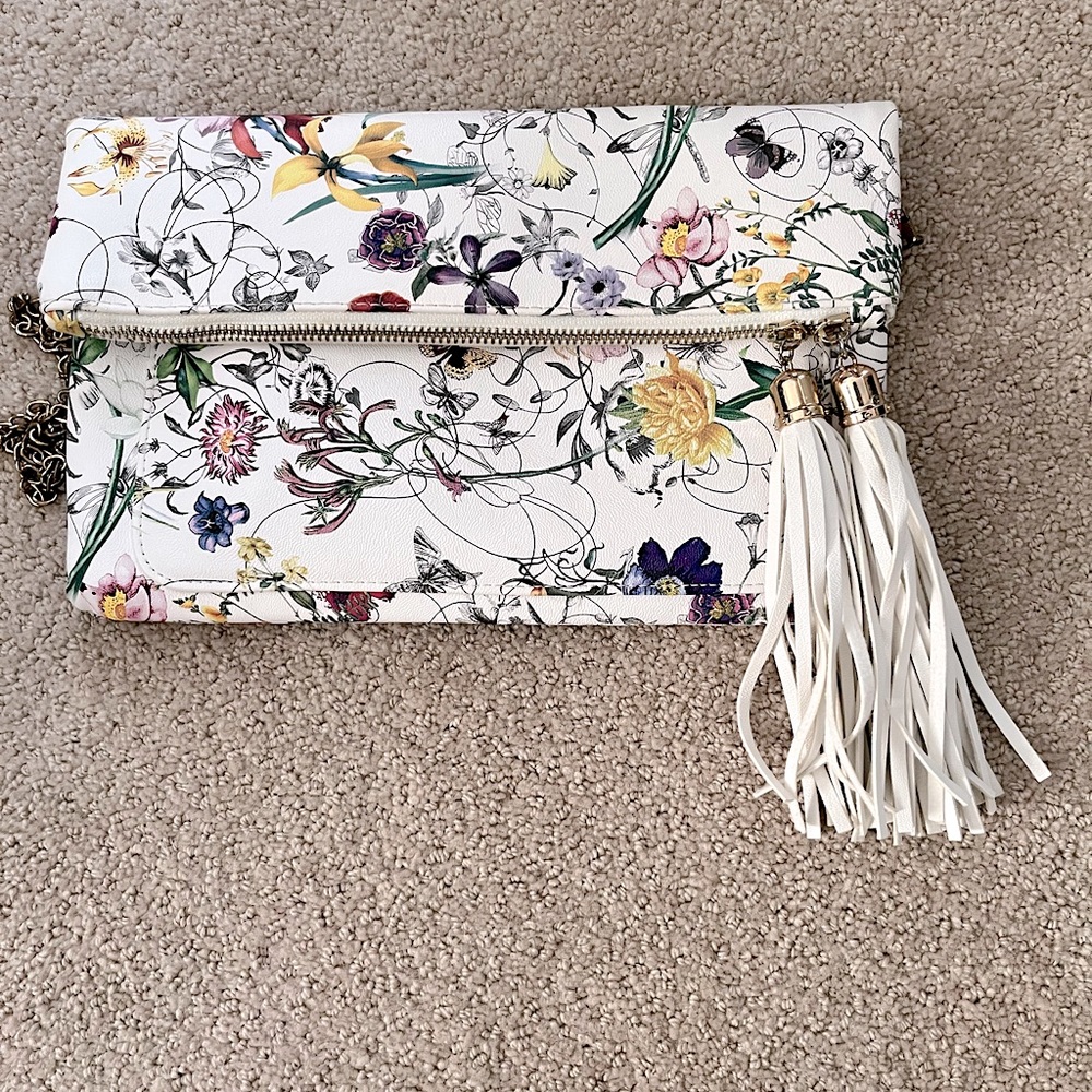 Floral clutch with removable metal strap